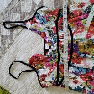 Like new . Under bust stretches to 19 inches. So fun